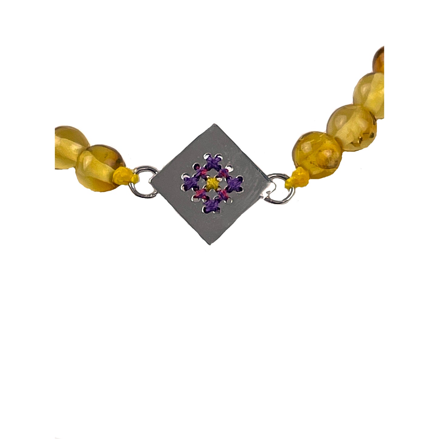 Pulsera lila bolitas rombo