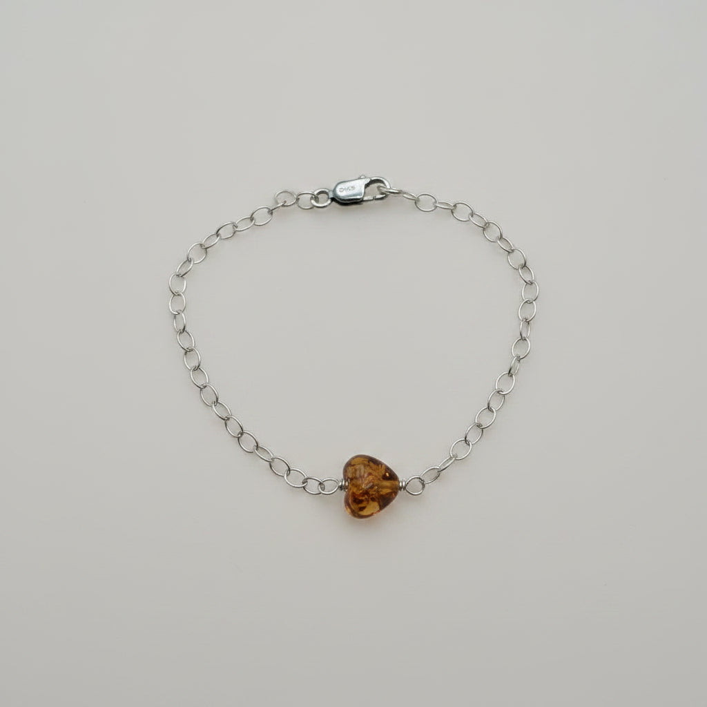 PULSERA CADENA CORAZON ATRAVEZADO