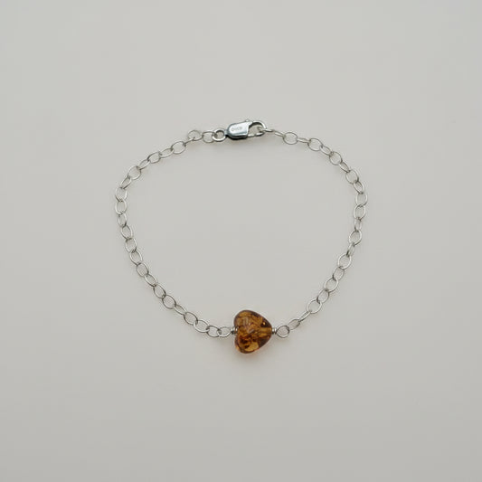 PULSERA CADENA CORAZON ATRAVEZADO